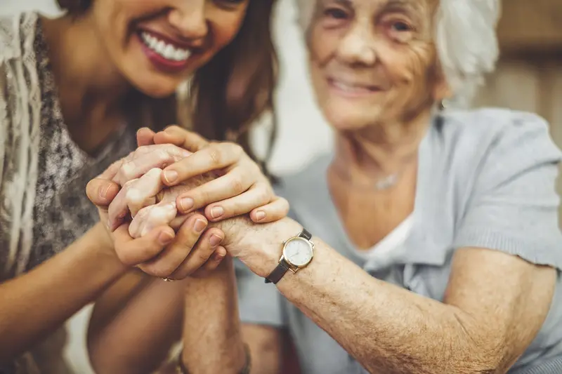 Women holding hands